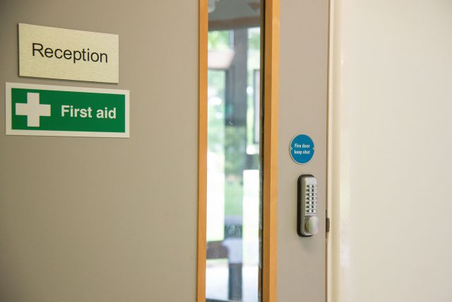 Fire Door with First Aid Sign